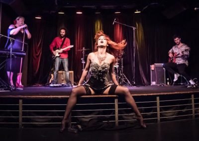 Sydney Burlesque Dancer Kelly Ann Doll live on stage at The Basement Sydney with Live Band