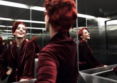 Sydney Burlesque Dancer Kelly Ann Doll in front of a Mirror