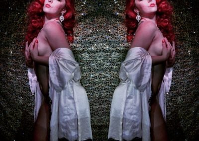 Studio Shot of Kelly Ann Doll in a white robe promoting Up Late and Un Cut Sydney